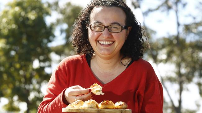 Lisa Bright with pastizzi — a popular Maltese pastry, usually encasing ricotta or peas. Picture: John Appleyard