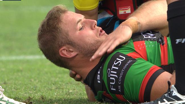 Tom Burgess received medical attention after copping a hit off the ball from Elliott Whitehead.