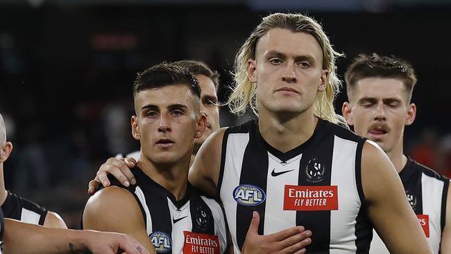 MELBOURNE , AUSTRALIA. March 15 , 2024.  AFLÃ Round 1. Collingwood vs Sydney Swans at the MCG.  Darcy Moore and Nick Daicos of the Magpies after tonights loss to Sydney   . Pic: Michael Klein