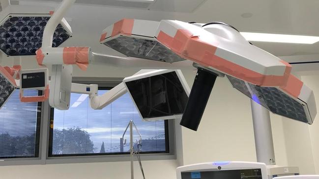 Lights in an operating theatre at the Launceston General Hospital which have been patched with tape.