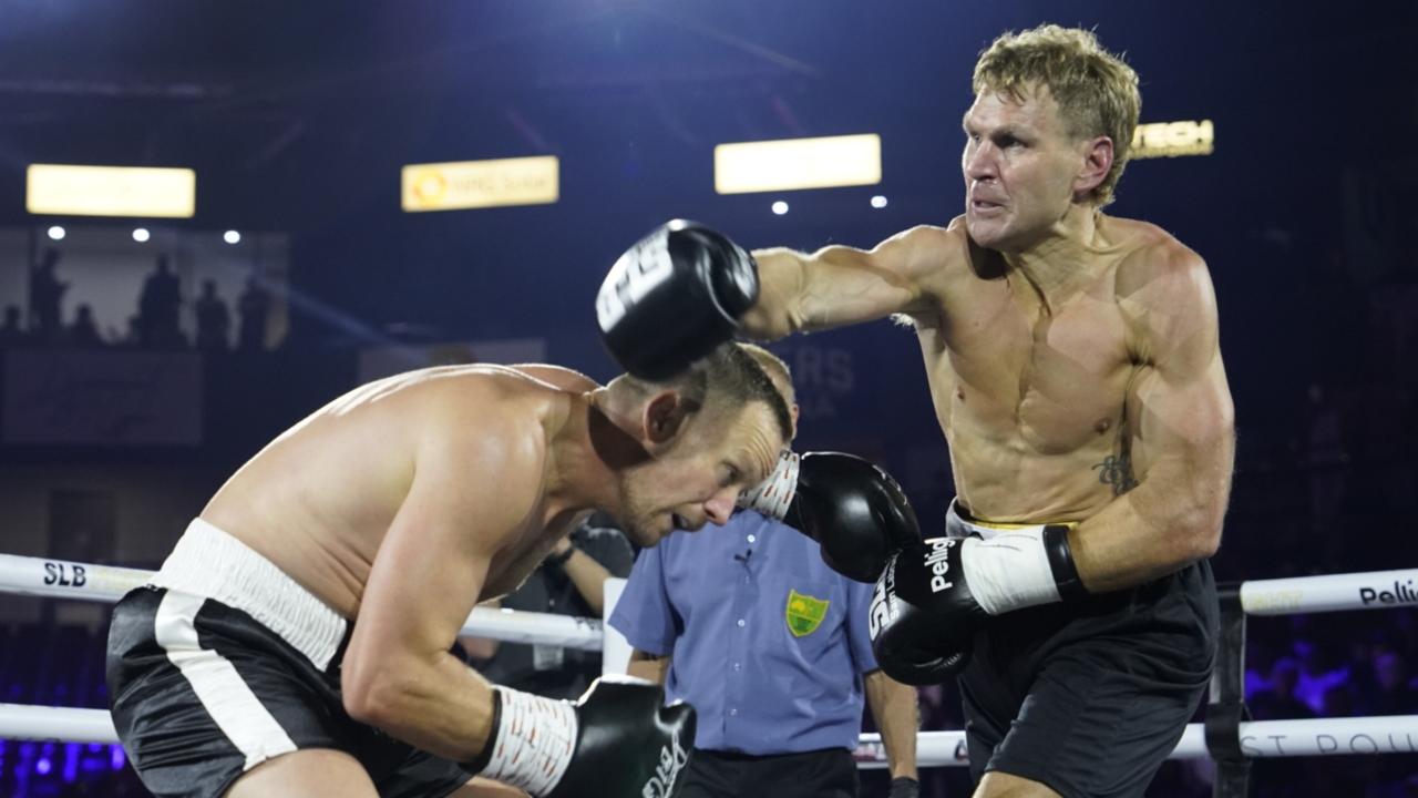 Kane Cornes throwing a rare right hand at The Gathering boxing event.