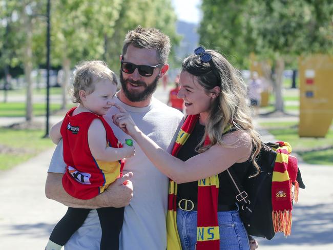 Isabelle, Mitch and Tabitha Weller before the Gold Coast Swans take on the Sydney Swans at People First Stadium, Carrara. Picture: Glen Campbell