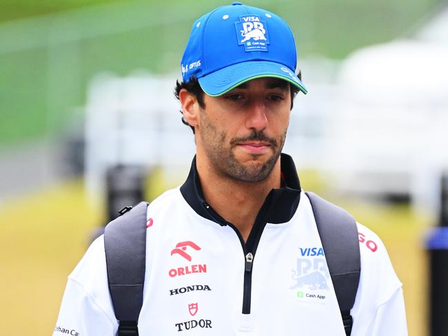 SUZUKA, JAPAN - APRIL 06: Daniel Ricciardo of Australia and Visa Cash App RB walks in the Paddock prior to final practice ahead of the F1 Grand Prix of Japan at Suzuka International Racing Course on April 06, 2024 in Suzuka, Japan. (Photo by Clive Mason/Getty Images)