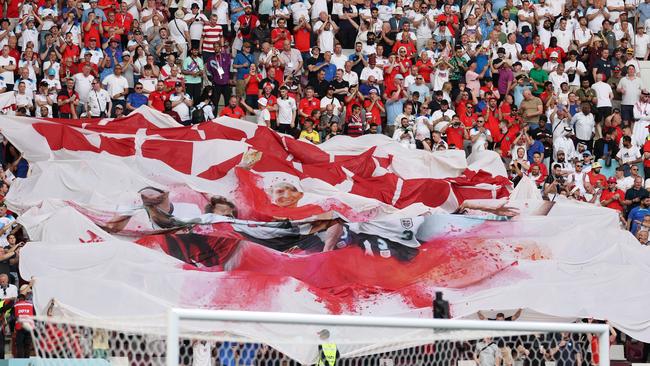 England fans let loose in the stands in Doha.