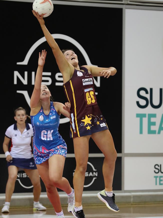 Austin wins the ball over Contax’s Molly Watson in the 2020 Premier League grand final. She was named MVP for the match. Picture: Richard Keane, Sports in Focus