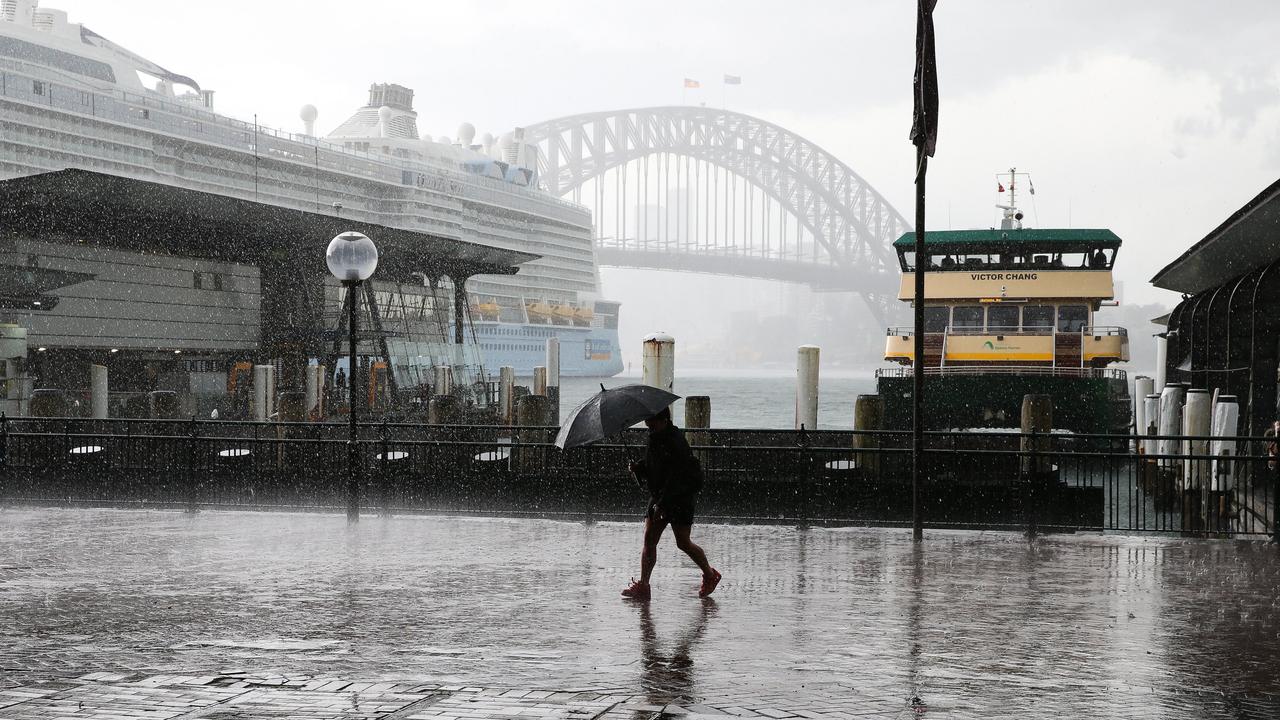 Wild weather hit Circular Quay in Sydney on Wednesday afternoon with small hail stones and rain. Picture: NCA Newswire/Gaye Gerard