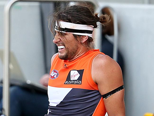 North Melbourne versus GWS at Blundstone Arena. GWS' Ryan Griffen gets his ankle looked at. Picture: SAM ROSEWARNE.