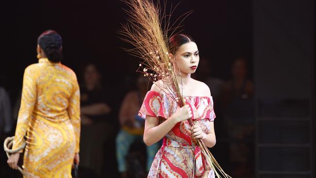Nardia Blackhall models the Oochunyung collection by designer Fiona Wirrer-George at the Cairns Indigenous Art Fair fashion performance, Woven, held at the Tanks Arts Centre, Edge Hill. Picture: Brendan Radke