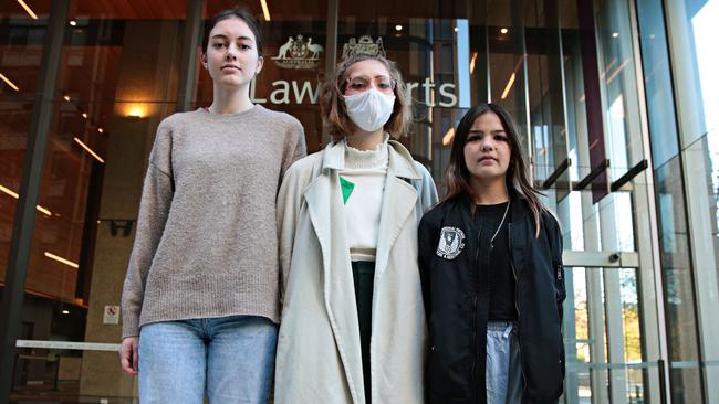 School students (L-R) Laura Kirwan (17), Ava Princi (17) and Izzy Raj-Seppings (14) in front of the Federal Law Court after their initial court victory in May 2021. Picture: NCA NewsWire / Adam Yip