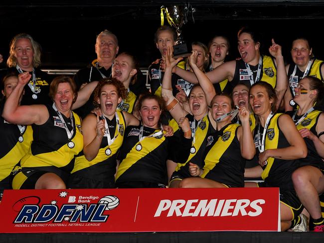 Kyneton pose with the premiership cup after winning the 2023 Rookie Me RDFNL WomenÃs Grand Final match between Kyneton and Macedon at Gilbert Gordon Oval in Woodend, Victoria on August 5, 2023. (Photo by Josh Chadwick)