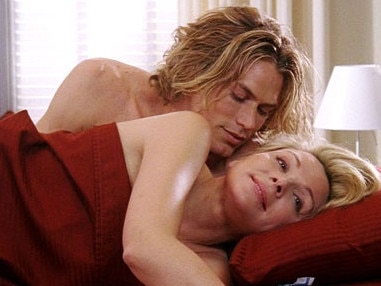 Samantha and Smith in bed in Sex and the City.