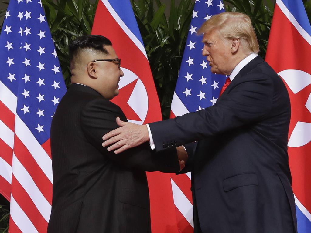 President Donald Trump shakes hands with North Korea leader Kim Jong Un at the Capella resort on Sentosa Island in Singapore. Picture: AP