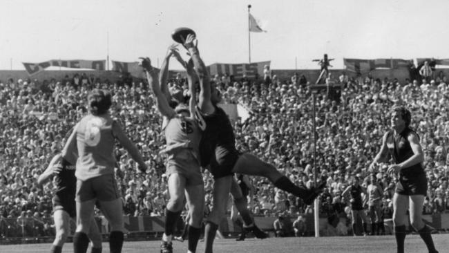 Norwood's Neil Button and Sturt's Robert Klomp battle for a mark in the 1978 SANFL grand final at Football Park.