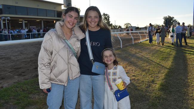 Izzy, Maggie and Elle at the Roma Rugby Races at Bassett Park on Saturday June 24, 2023. Picture: Chloe Cufflin.