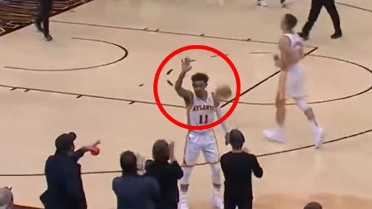 Trae Young waved goodbye to the Cleveland crowd.