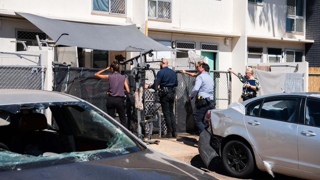 Detectives knocks on doors at the crime scene in Litchfield Court residence. Picture: Pema Tamang Pakhrin