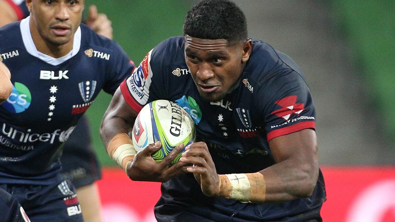 Isi Naisarani of the Rebels runs the ball forward at AAMI Park in Melbourne.