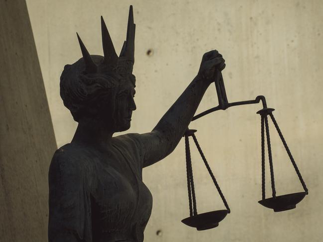 BRISBANE , AUSTRALIA - NewsWire Photos - BRISBANE , JUNE 24 2024: Generic photo of the scales of justice stature outside Brisbane Supreme Court in the Brisbane CBD. Picture: NewsWire / Glenn Campbell