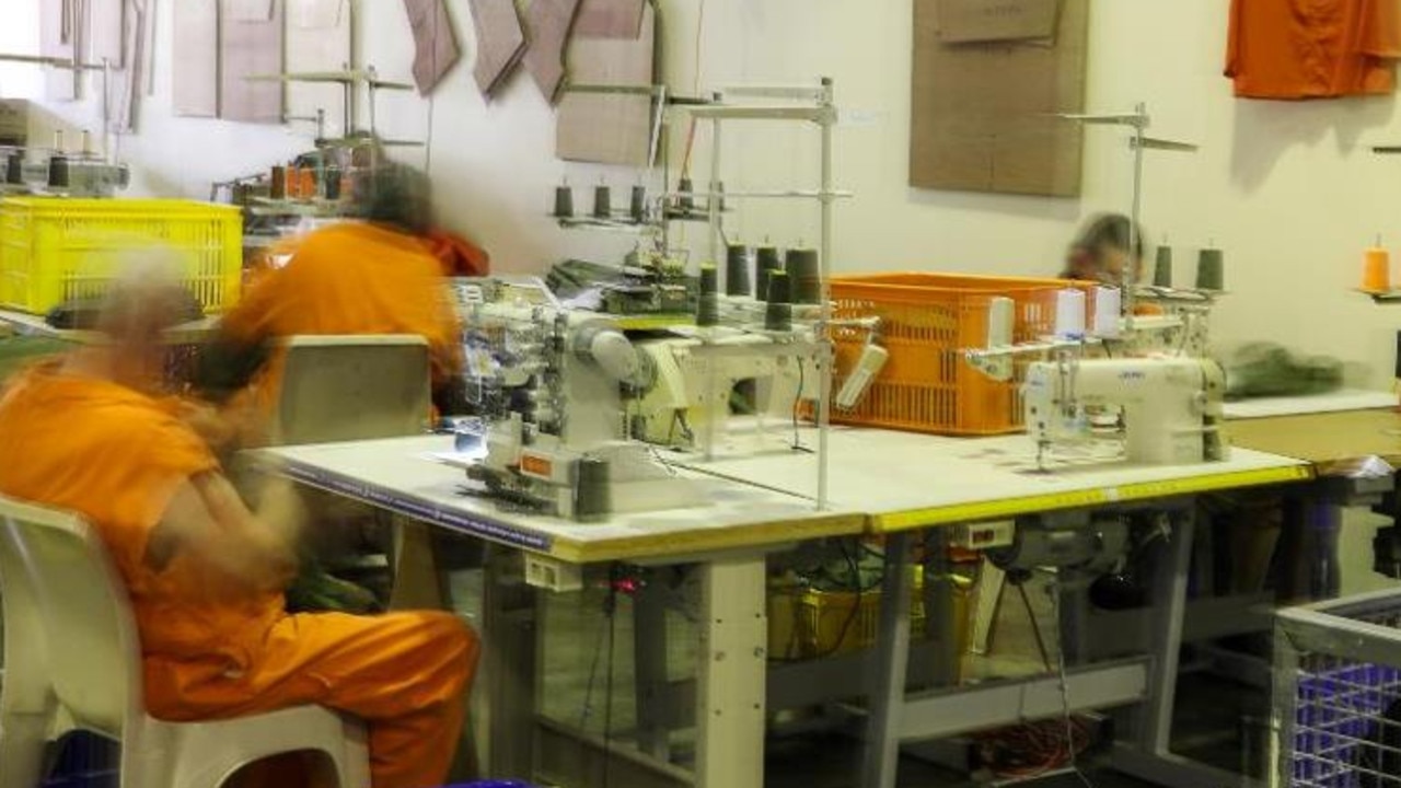 Prisioners working in the sewing centre at Maryborough Correctional Centre.