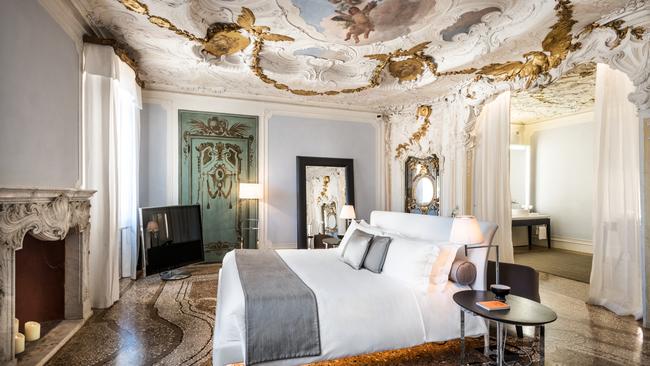 At Aman Venice, the Alcova Tiepolo Suite features 18th-century frescoes.