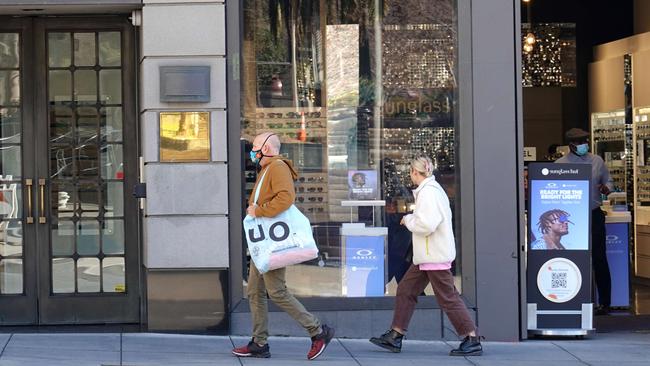 Pedestrians walk by shops in Union Square, in San Francisco. Picture: Justin Sullivan/Getty Images/AFP