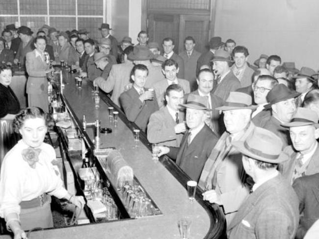 It was men only in Melbourne’s bars and pubs in 1954. Watering holes closed at 6pm causing a rush of people after offices closed at five. This picture was taken in the London Hotel. Picture: State Library of Victoria.