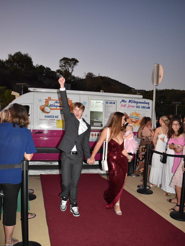 Jade Anell, Kayla Glossop, and daughter Rileigh Glossop-Anell at the Proserpine State High School formal at Shute Harbour Marine Terminal on November 15, 2023. Photo: Zoe Devenport