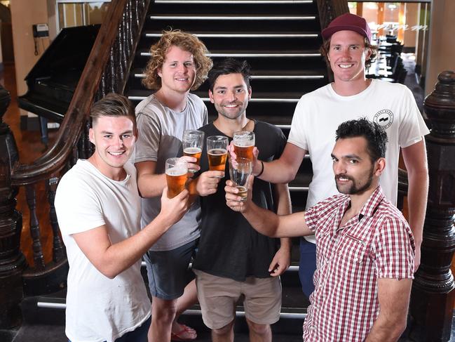 Mentone Hotel regulars Jack Jansson, Luke Hull, Tristan Strange, Mitch Brown, and Julian Strange enjoy a final beer. Picture: Jason Sammon.