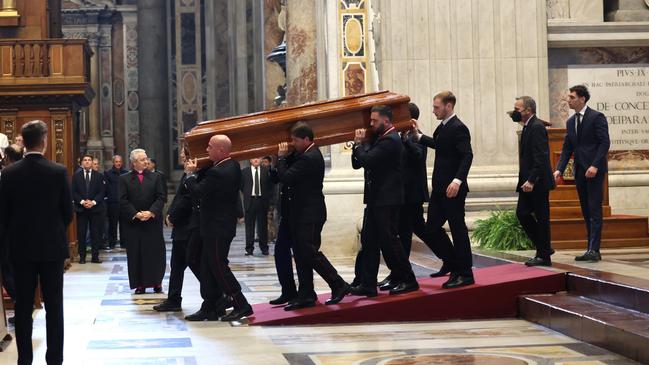 Pallbearers carry the coffin of Cardinal George Pell at his funeral. Picture: Franco Origlia/Getty Images