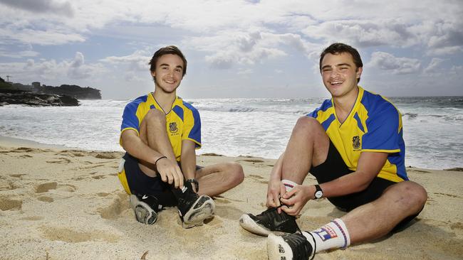 Adam Hegedus and Alexi Piovano at Bronte Beach before their 750km walk to Byron Bay. Picture: John Appleyard