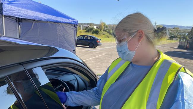 A health worker tests a patient in their vehicle. Picture Amy Ziniak