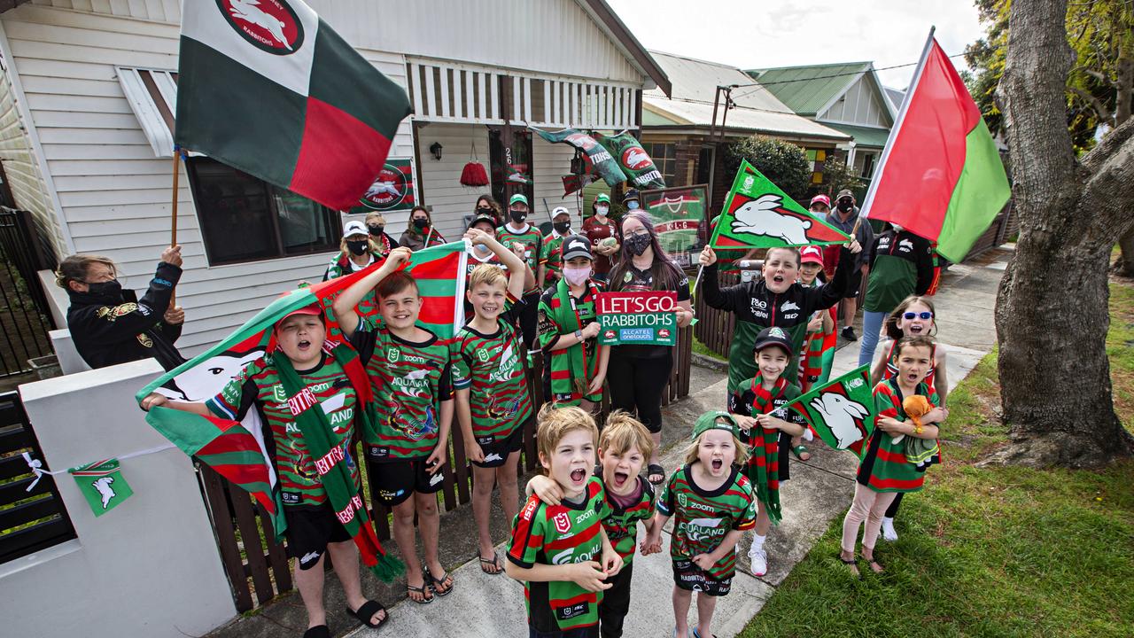 McBurney Ave's South Sydney fans cheer for their team a head of this weekends NRL grand final. Picture: Adam Yip