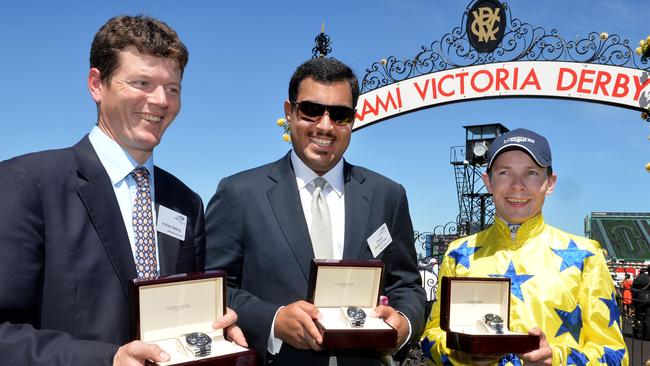 Andrew Balding (left) at Flemington in 2013 when Side Glance, ridden by Jamie Spencer (right), won the Group 1 Mackinnon Stakes. Picture: Jay Town