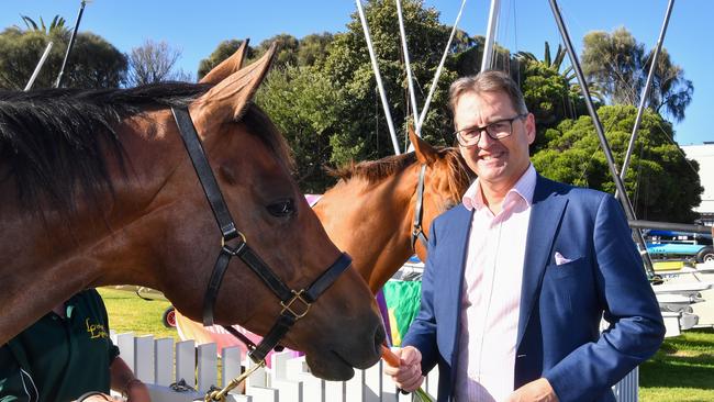 Racing Victoria CEO Andrew Jones with retired racehorse Harlem at The Festival of Racing Launch at Port Melbourne Yacht Club on February 06, 2024 in Melbourne, Australia. (Photo by Pat Scala/Racing Photos via Getty Images)