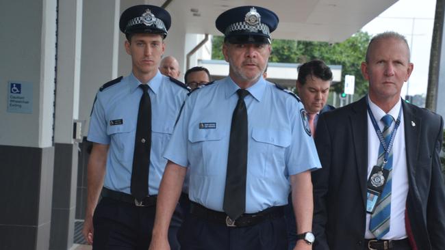 Queensland Police entering Cairns Court House for the inquest into the police shooting death of Luke Gilbert, 24, at Airlie Beach on October 1, 2022. Picture: Bronwyn Farr