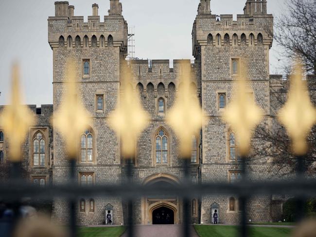 Windsor Castle guards stand in their sentry box at an entrance to Windsor Castle. Picture: AFP