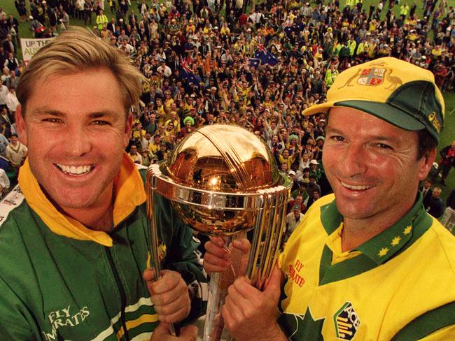 Cricketer Shane Warne (l) with Steve Waugh celebrating winning holding World Cup Trophy.Cricket - Australia vs Pakistan World Cup grand final match at Lords 20 Jun 1999.