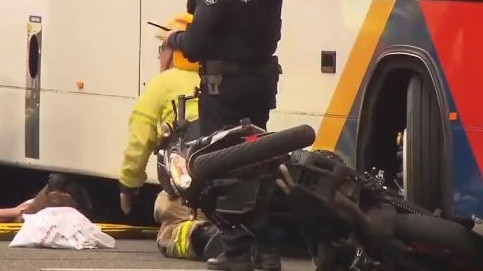 A learner driver on a motorbike has crashed into a bus in the CBD. Picture: 7NEWS