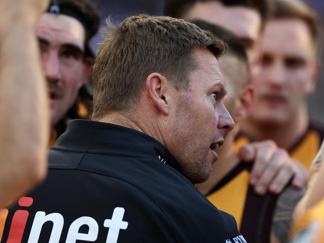 PERTH, AUSTRALIA - JUNE 30: Sam Mitchell, Senior Coach of the Hawks addresses the team at three quarter time break during the 2024 AFL Round 16 match between the West Coast Eagles and the Hawthorn Hawks at Optus Stadium on June 30, 2024 in Perth, Australia. (Photo by Will Russell/AFL Photos via Getty Images)