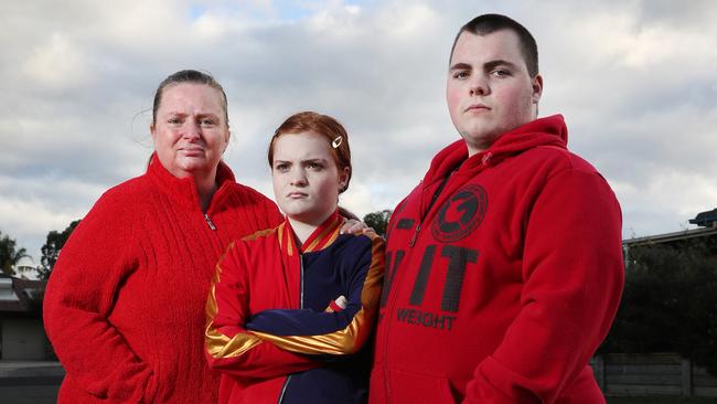 Pictured at their home in Glenfield is Tracey Bradney with her kids Ashleigh (14) and Jordan (21). Tracey is forced to commute an hour to Westmead hospital for her children's treatment for Cystic Fibrosis. Picture: Richard Dobson