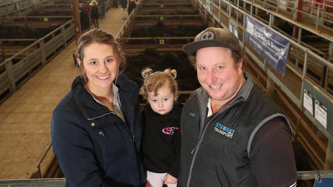 Kate and Casey Stewart with their daughter Marley, 2-years-old from Stewart Bros Transport, Pakenham. Pictures: Yuri Kouzmin.