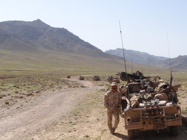 A big man in a big land ... Cameron Baird VC MG on duty in Afghanistan. Picture: Courtesy of the Baird family