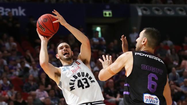 Chris Goulding tries to get a shot away for Melbourne. Picture: AAP