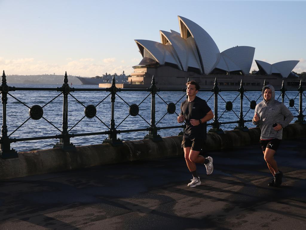 Angela Mollard says tourists and locals can run in front of the Opera House at dawn but why not hold yoga classes there, too. Picture: NewsWire