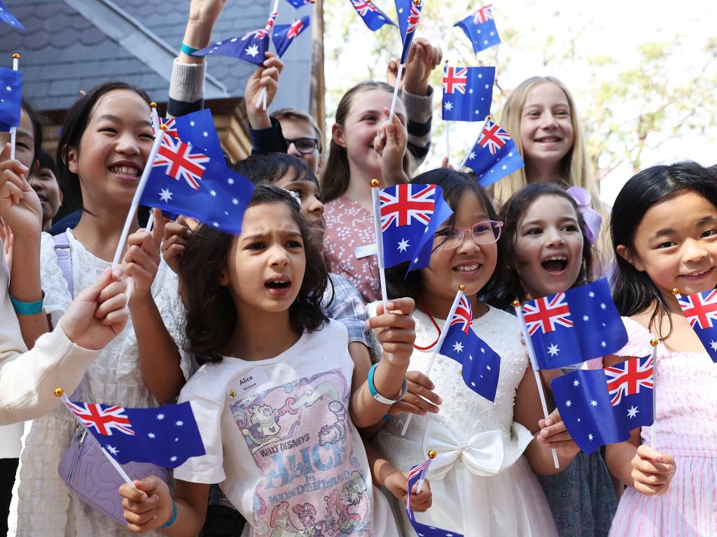 Children wait patiently outside St Thomas's Church in North Sydney to catch a glimpse of Queen Camilla and King Charles III. Picture: WireImage