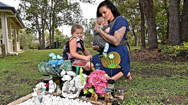 MUM'S HEARTACHE: Deanne Gillbee, pictured with daughter Ciarah, 9 and son Ryder, five months, is pleading for increased security at the Caloundra Cemetery after her son's grave was targeted by thieves for the second time. Picture: Warren Lynam