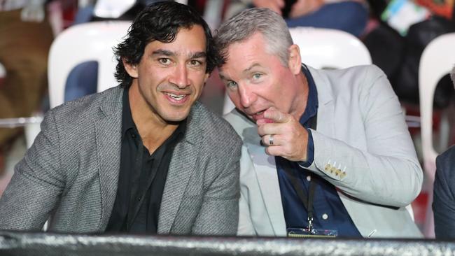 Thurston and with former Cowboys coach Paul Green. Picture: Peter Wallis