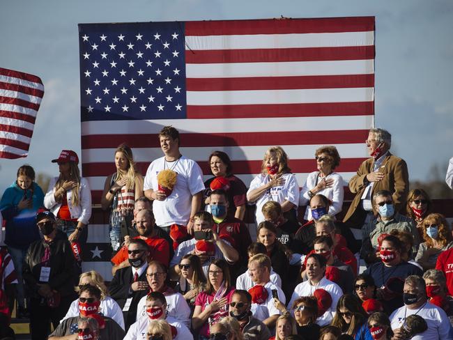 A crowd of thousands waits for Donald Trump at a rally in Hickory, North Carolina, USA. Picture: Angus Mordant