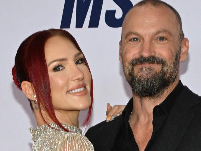 US actor Brian Austin Green and his wife Australian dancer Sharna Burgess attend the 32nd annual Race to Erase MS Gala at the Fairmont Century Plaza in Los Angeles, May 16, 2025. (Photo by Lisa O'CONNOR / AFP)