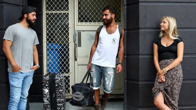 (l-r) Backpackers Marcos Renison from Argentina, Josh Dagan from Israel and Leeza Lapshin from Canada. Josh is being repatriated by the Israeli Government while Marcos and Leeza don’t know if they’ll be able to stay in Australia. Picture: Toby Zerna